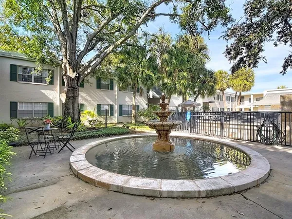 a view of a house with swimming pool