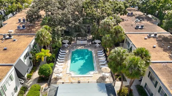 a view of a swimming pool with a patio