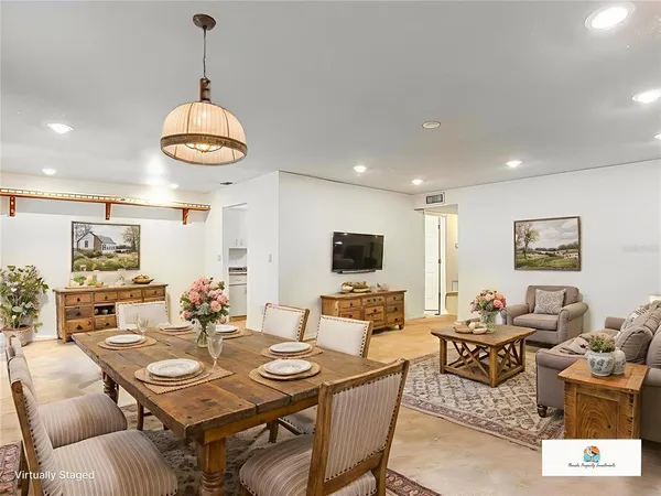 a view of a dining room with furniture