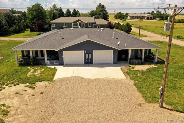 a view of a house with a swimming pool