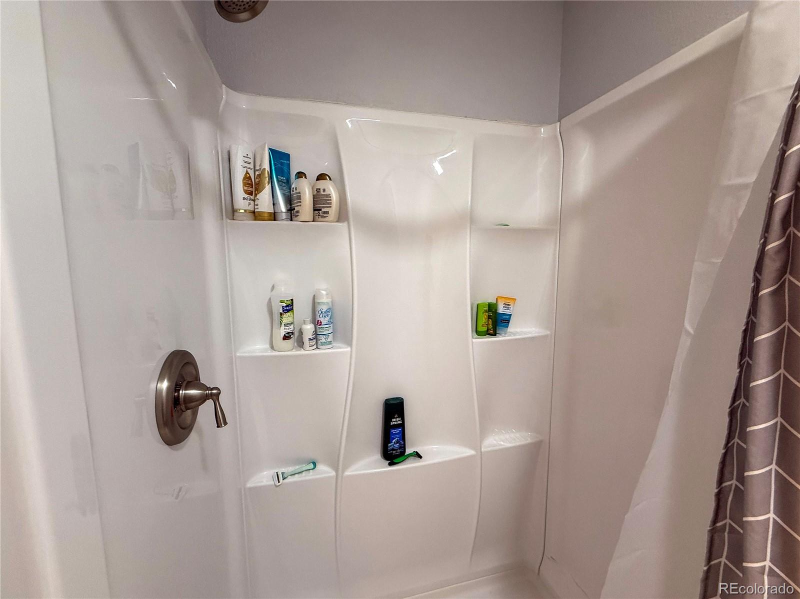 370 West 8th Street North, Unit A & B Cheyenne Wells, CO 80810 - Photo 22 of 47 a bathroom with a shower