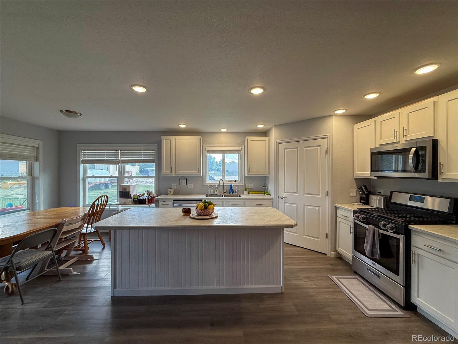370 West 8th Street North, Unit A & B Cheyenne Wells, CO 80810 - Photo 27 of 47 a view of kitchen with sink microwave and stove