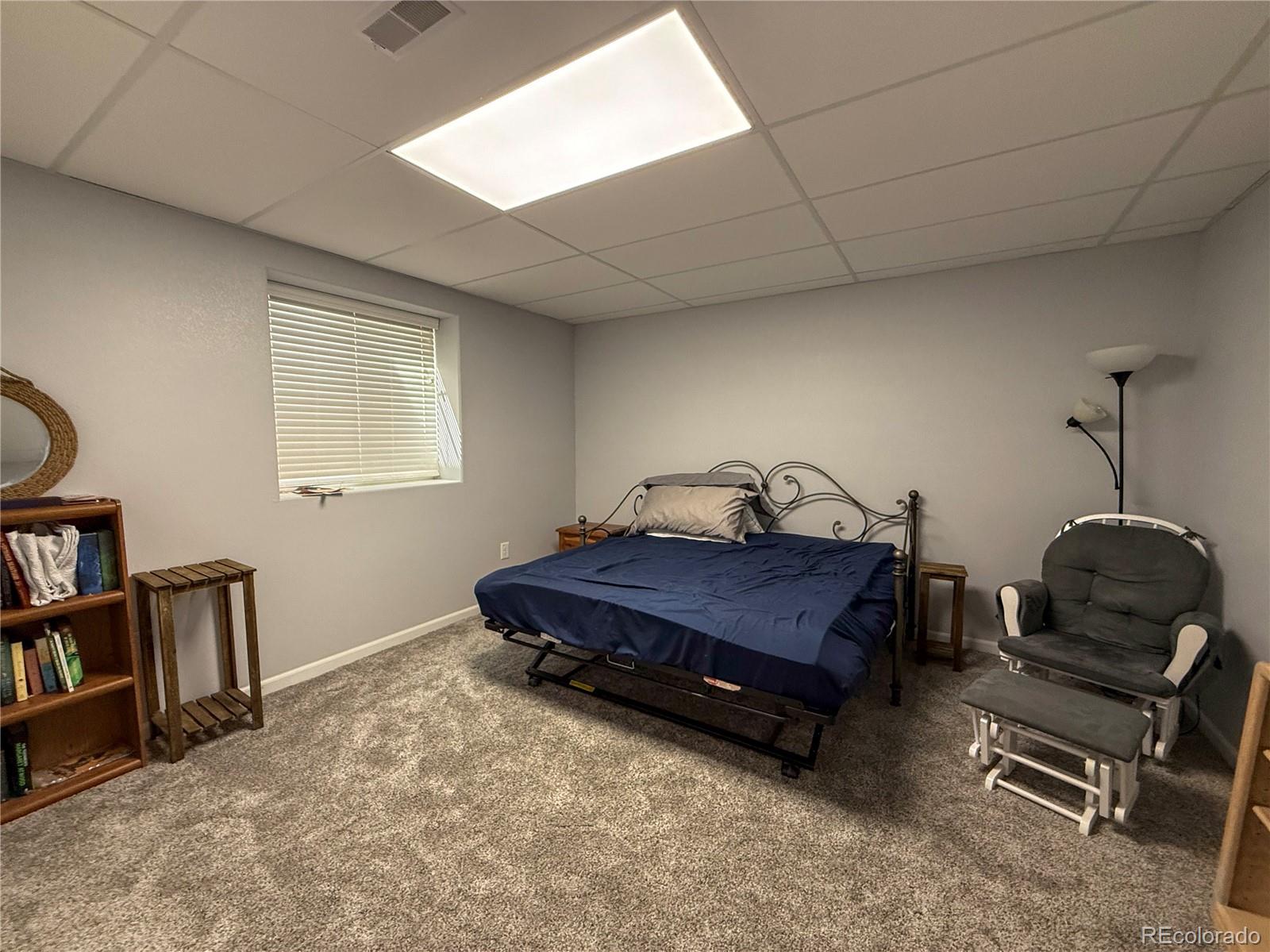 370 West 8th Street North, Unit A & B Cheyenne Wells, CO 80810 - Photo 40 of 47 a bedroom with furniture and a window