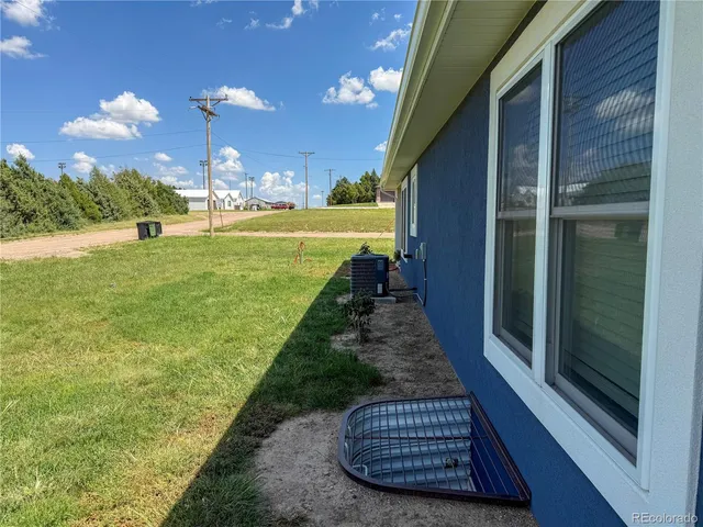 a view of a back yard of the house