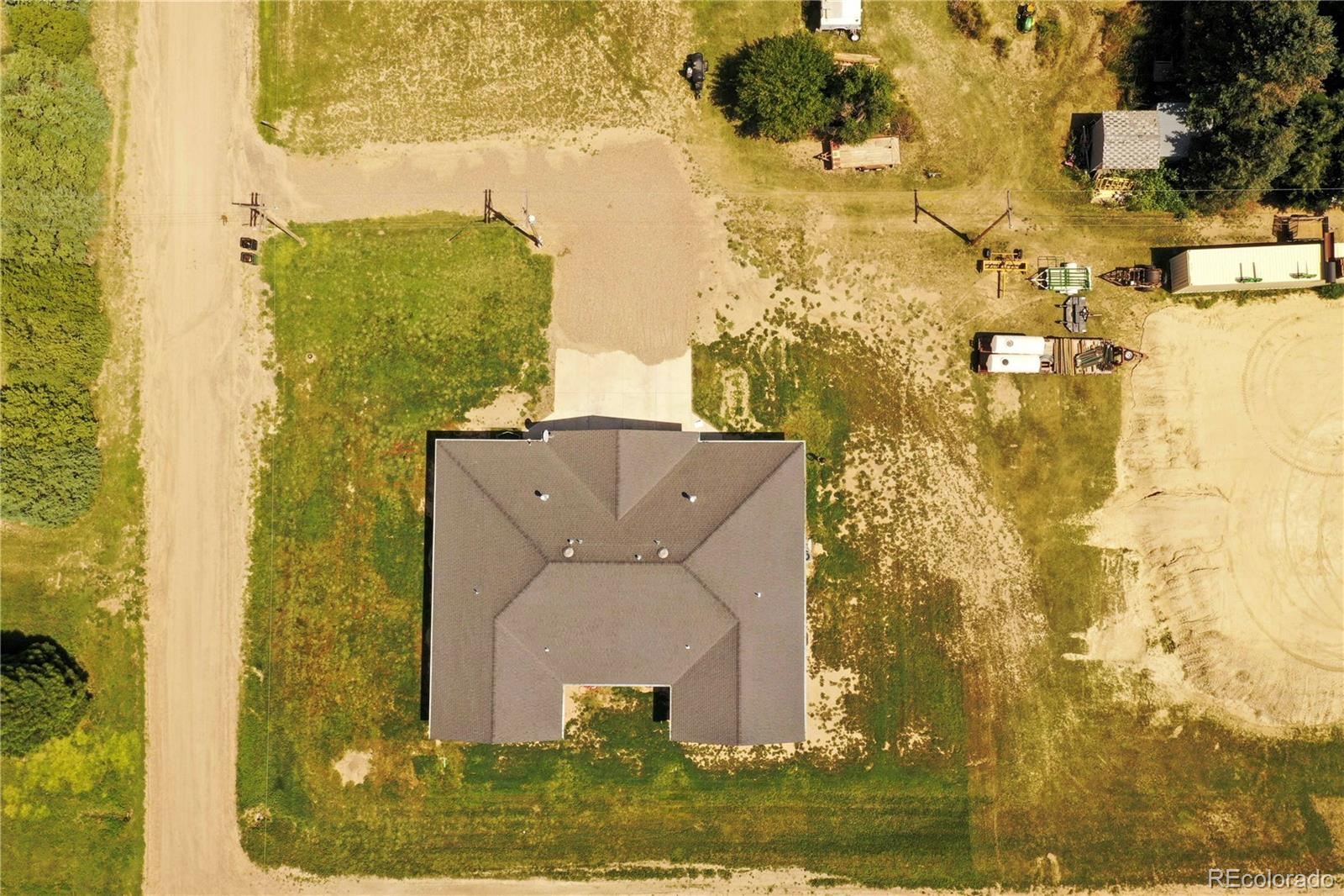 370 West 8th Street North, Unit A & B Cheyenne Wells, CO 80810 - Photo 47 of 47 a aerial view of a residential apartment building with a yard
