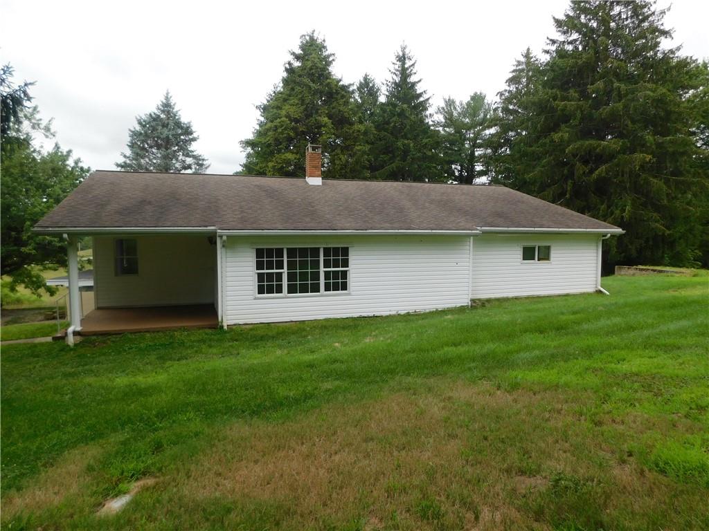 129 Herring Road Uniontown, PA 15401 - Photo 2 of 25 a view of a house with a backyard