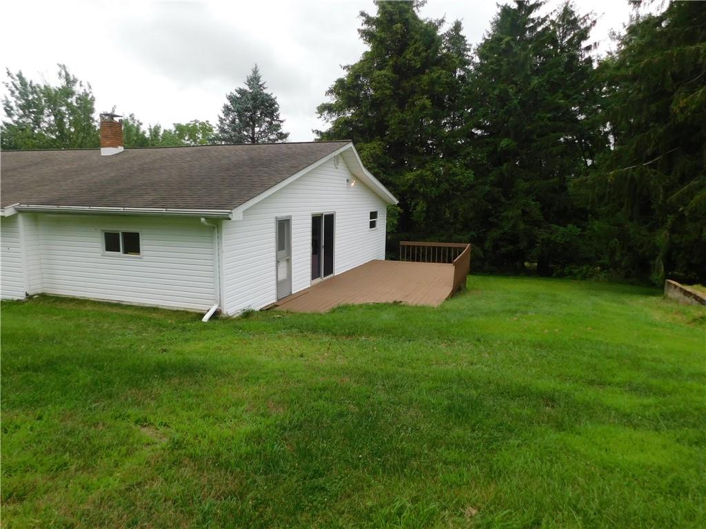 129 Herring Road Uniontown, PA 15401 - Photo 3 of 25 a backyard of a house with lots of green space