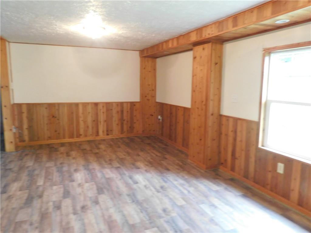 129 Herring Road Uniontown, PA 15401 - Photo 8 of 25 a view of an empty room with wooden floor