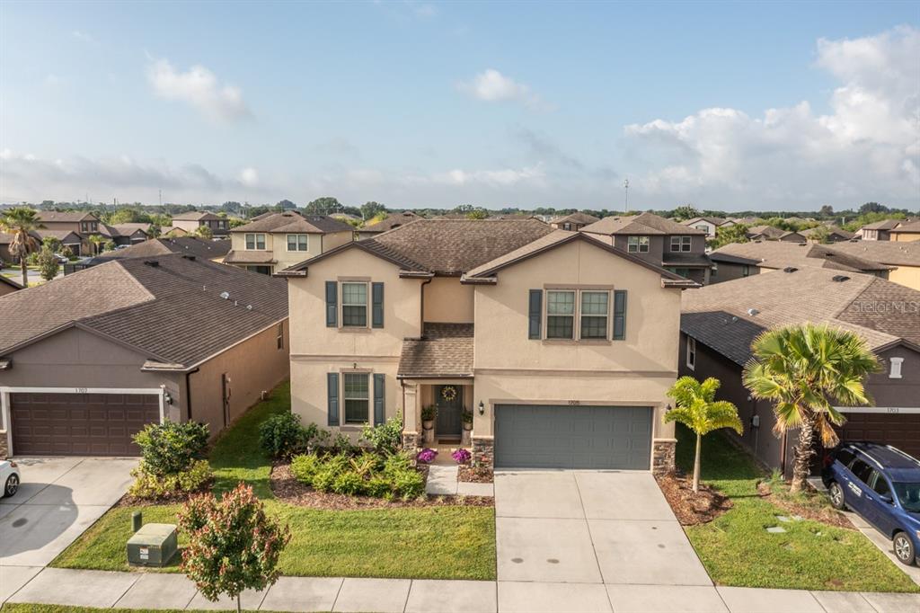 1705 Cabbage Key Drive Ruskin, FL 33570 - Photo 1 of 1 a view of a house with a yard and sitting area