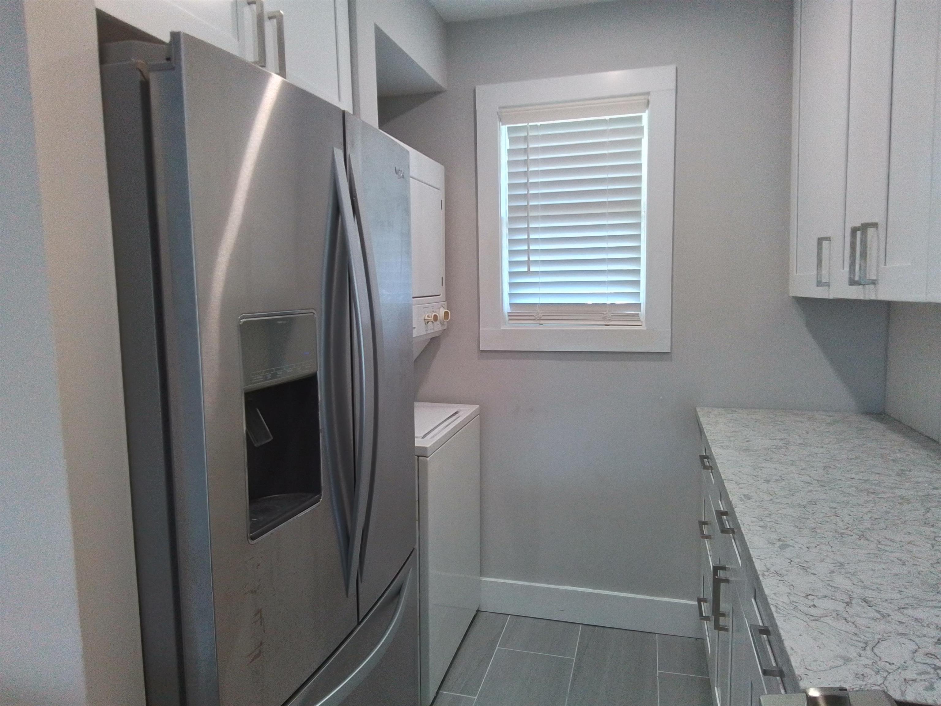 650 West Pope Road, Unit 244 St. Augustine, FL 32080 - Photo 23 of 27 a close view of refrigerator and sink