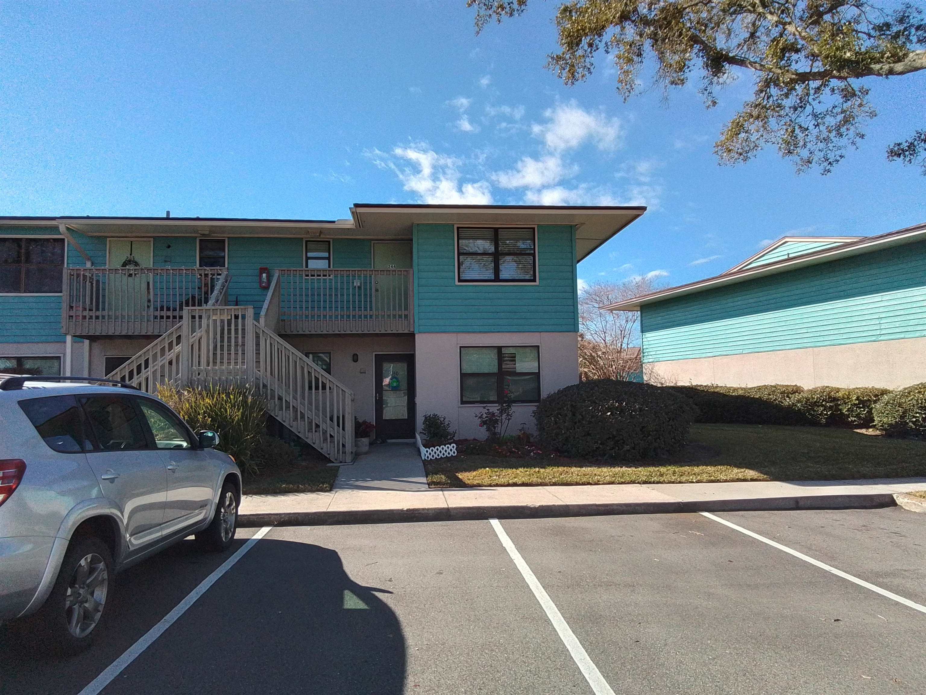 650 West Pope Road, Unit 244 St. Augustine, FL 32080 - Photo 27 of 27 a front view of house with yard