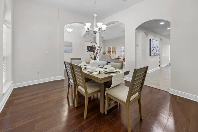 a kitchen with stainless steel appliances granite countertop a stove sink and cabinets