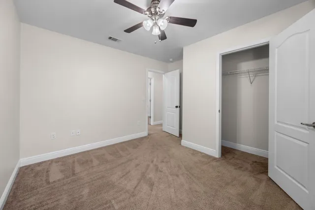 a view of a swimming pool with a porch