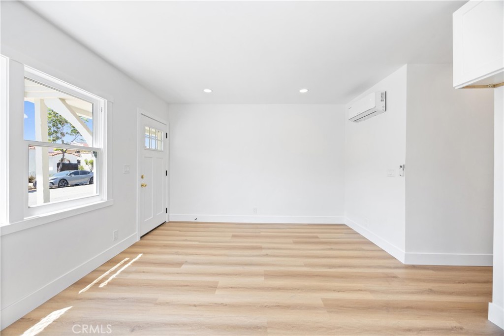852 Orange Avenue Long Beach, CA 90813 - Photo 28 of 39 a view of a room with wooden floor and window