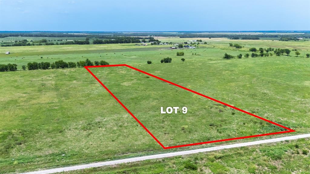 Lot 9 County Line Road Pecan Gap, TX 75469 - Photo 1 of 10 a view of a field with an ocean