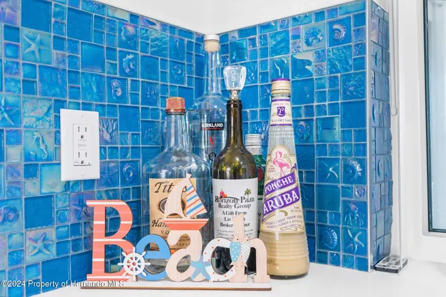 a view of a bathroom with bathtub and shower