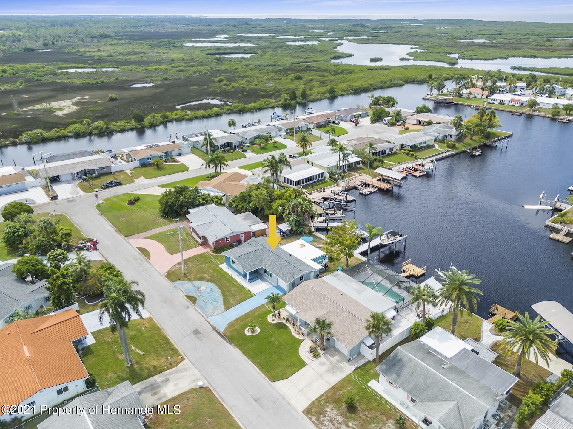12535 3rd Isle Hudson, FL 34667 - Photo 2 of 46 a view of a city with an ocean view
