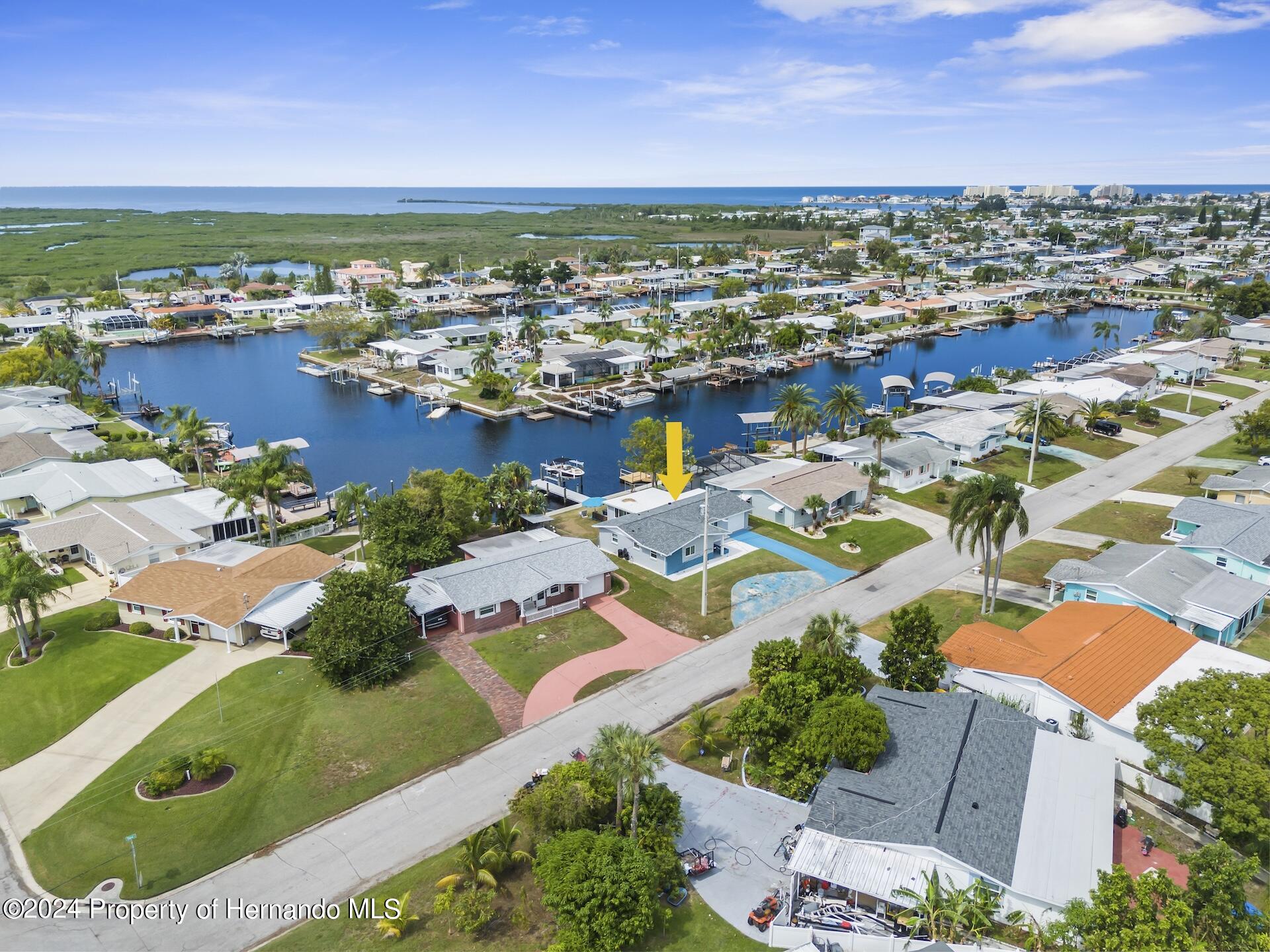 12535 3rd Isle Hudson, FL 34667 - Photo 6 of 46 an aerial view of residential houses with outdoor space