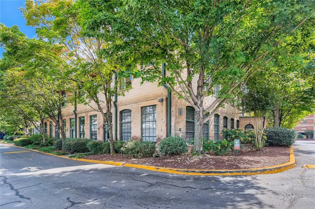 170 Boulevard Southeast, Unit 101F Atlanta, GA 30312 - Photo 2 of 11 a front view of house with yard and green space