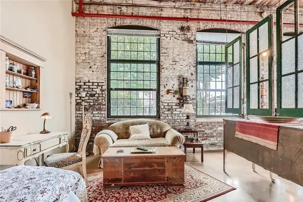 a living room with furniture and a window