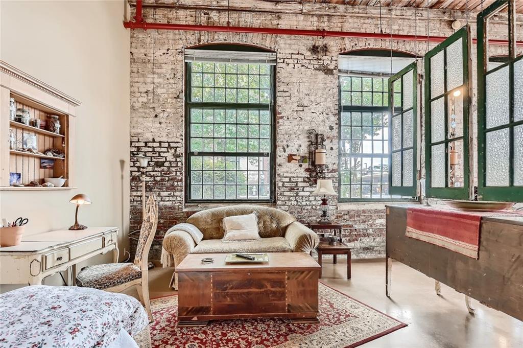 170 Boulevard Southeast, Unit 101F Atlanta, GA 30312 - Photo 6 of 11 a living room with furniture and a window