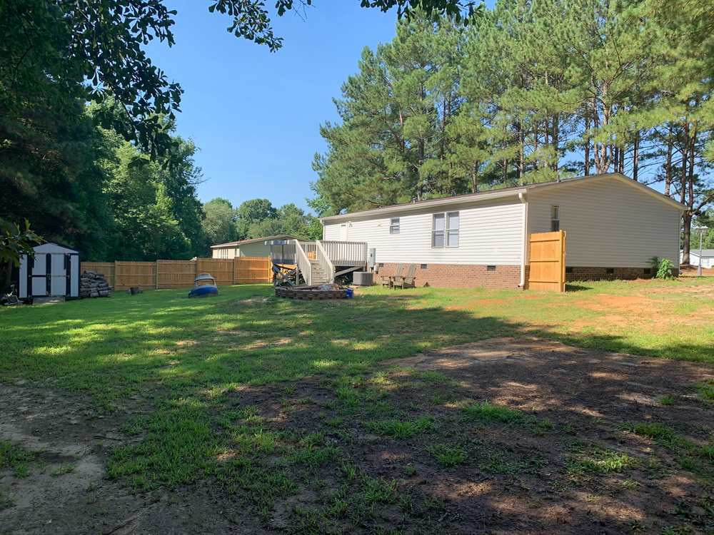 8834 Creek Road Willow Spring, NC 27592 - Photo 18 of 20 Privacy fence in backyard