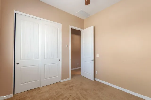 an empty room with closet