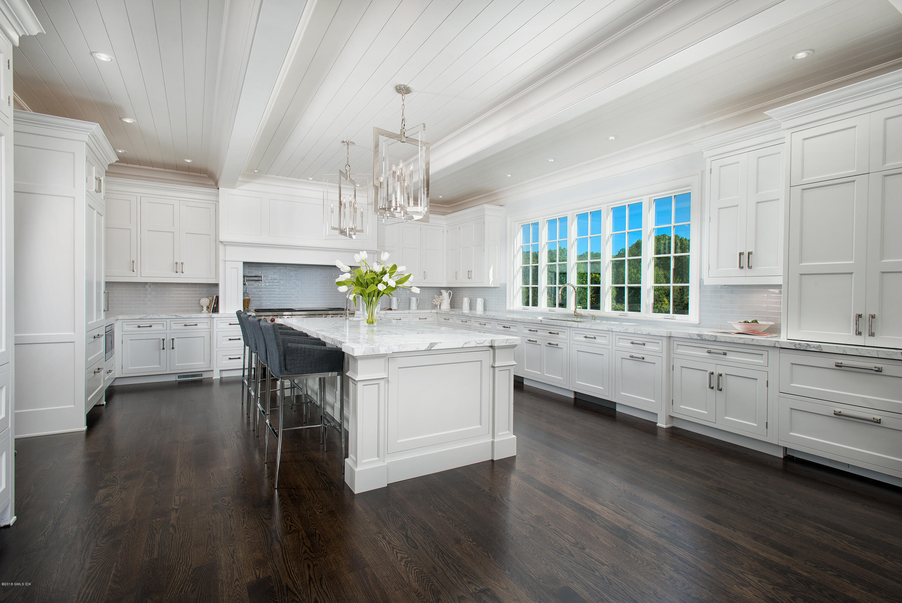 35 Mooreland Road Greenwich, CT 06831 - Photo 11 of 23 a kitchen with counter top space and wooden floor