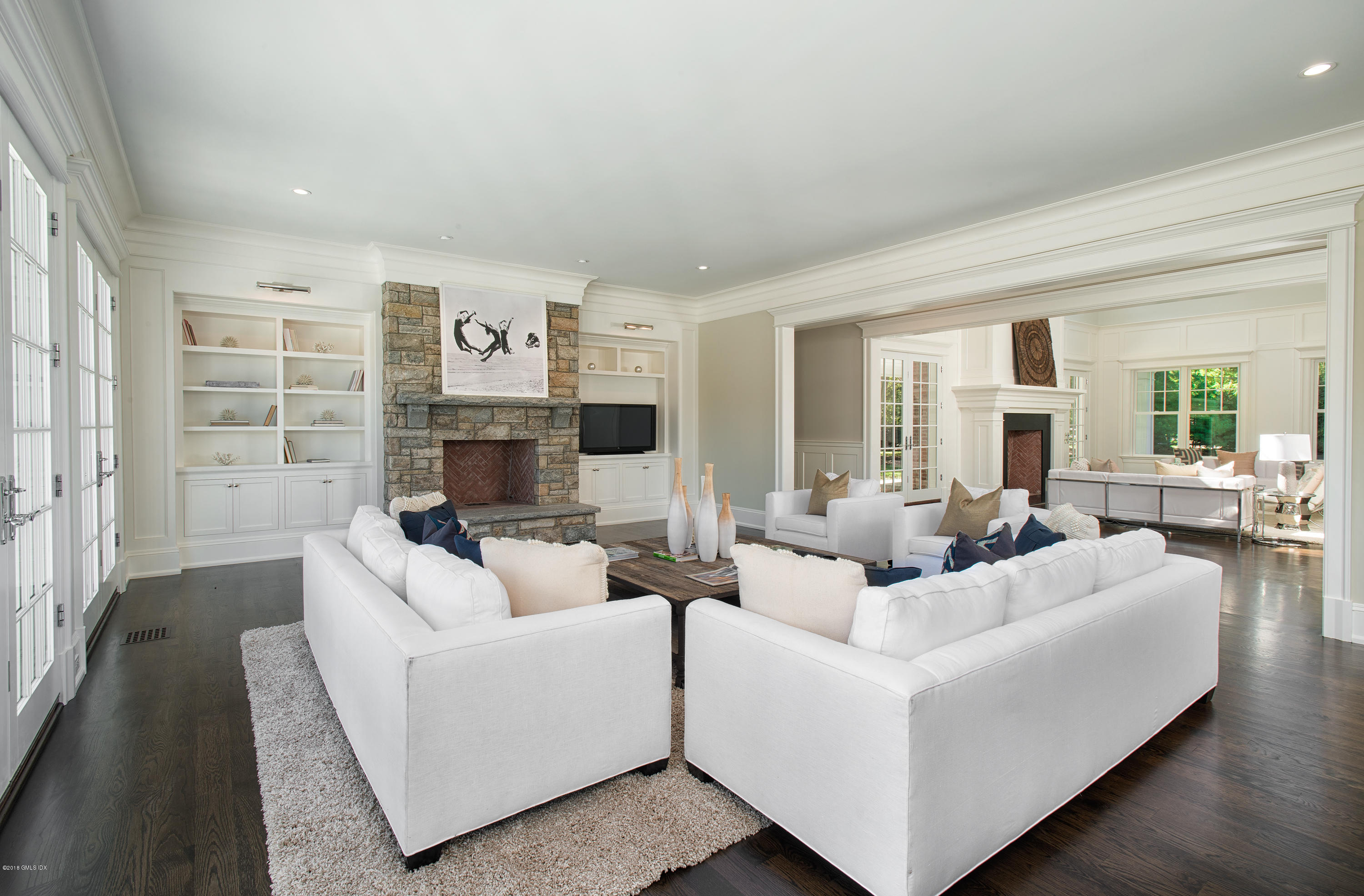 35 Mooreland Road Greenwich, CT 06831 - Photo 14 of 23 a living room with furniture and a fireplace
