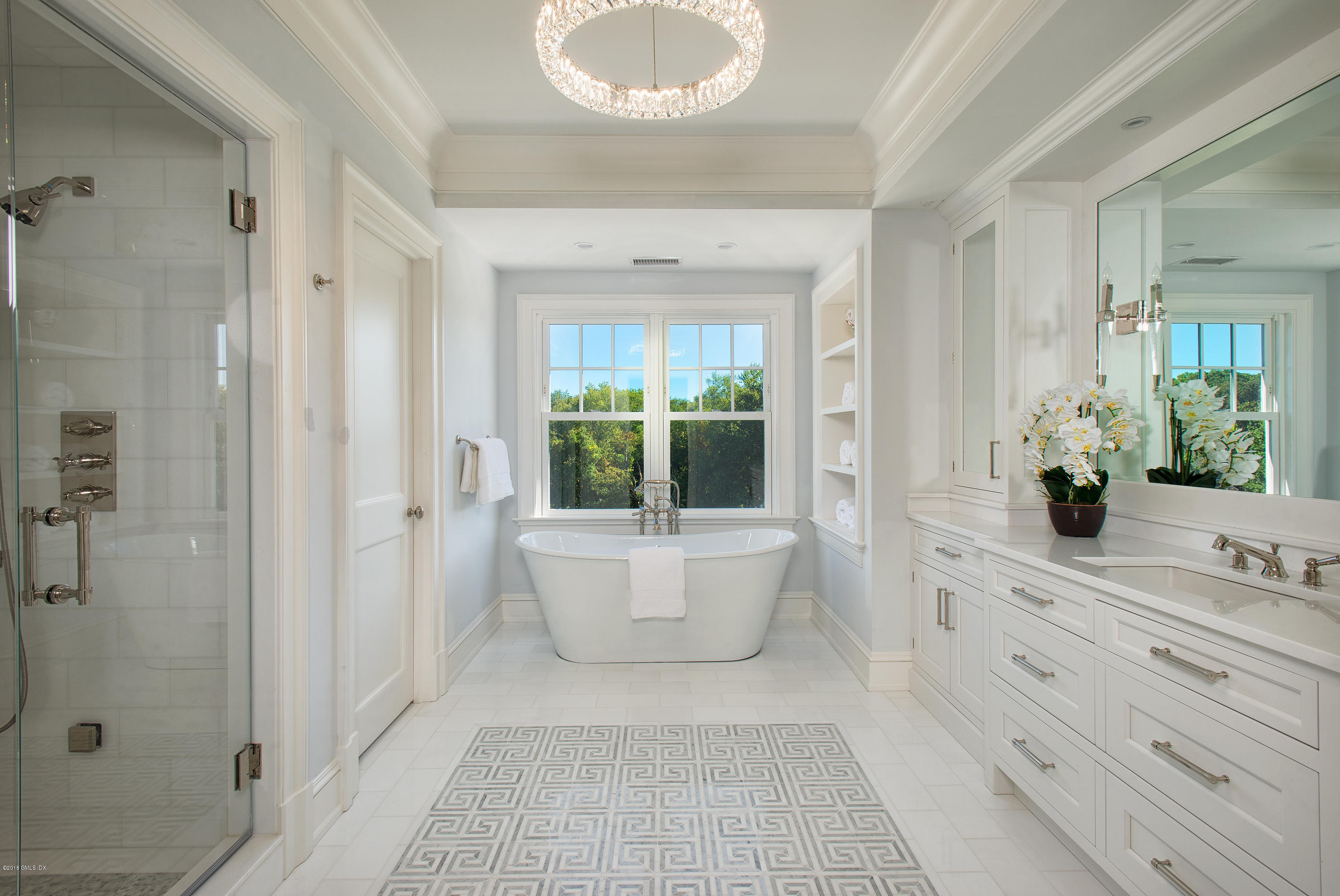 35 Mooreland Road Greenwich, CT 06831 - Photo 18 of 23 a spacious bathroom with a tub shower and sink