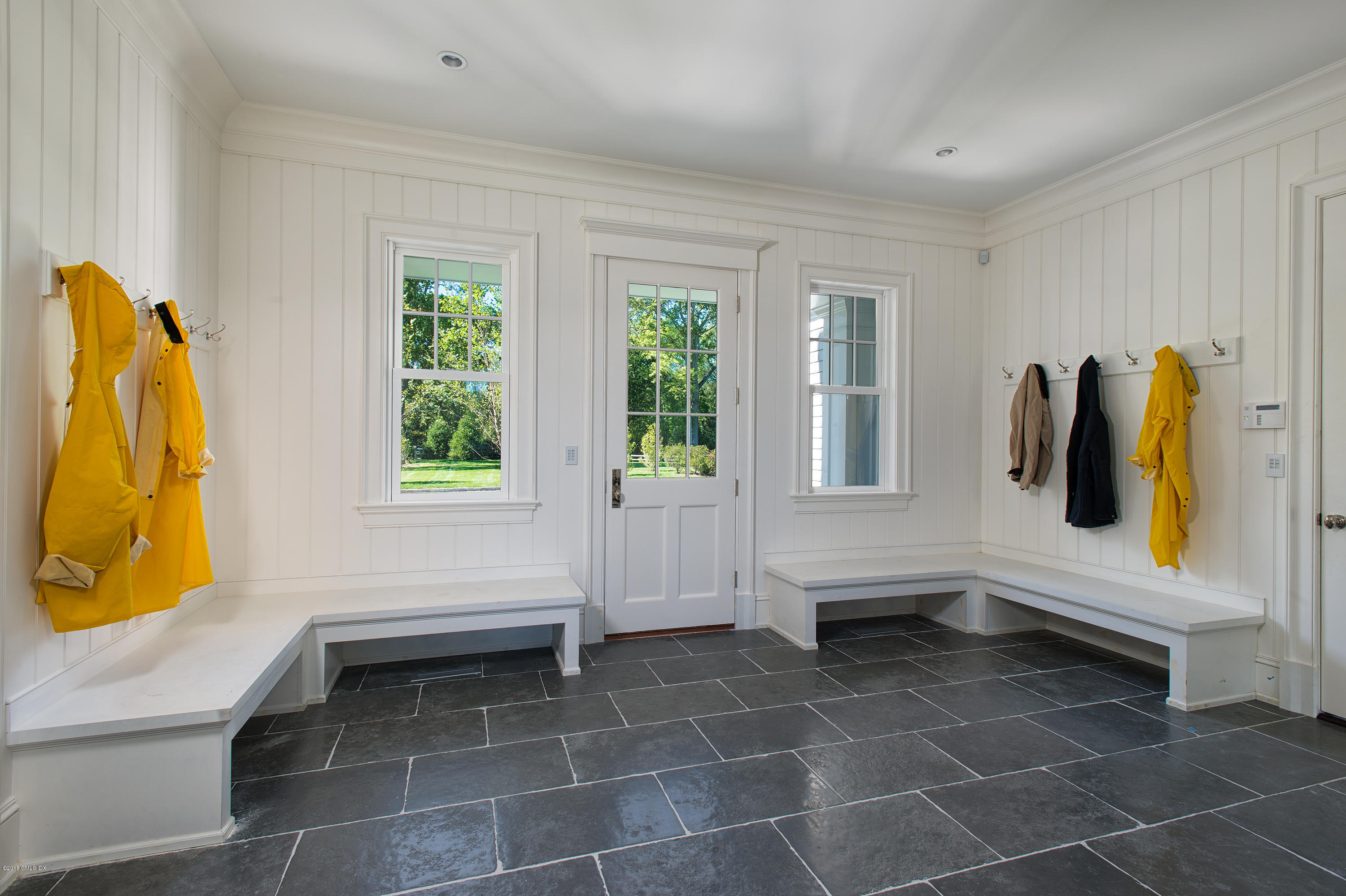 35 Mooreland Road Greenwich, CT 06831 - Photo 19 of 23 a bathroom with a bathtub and a window