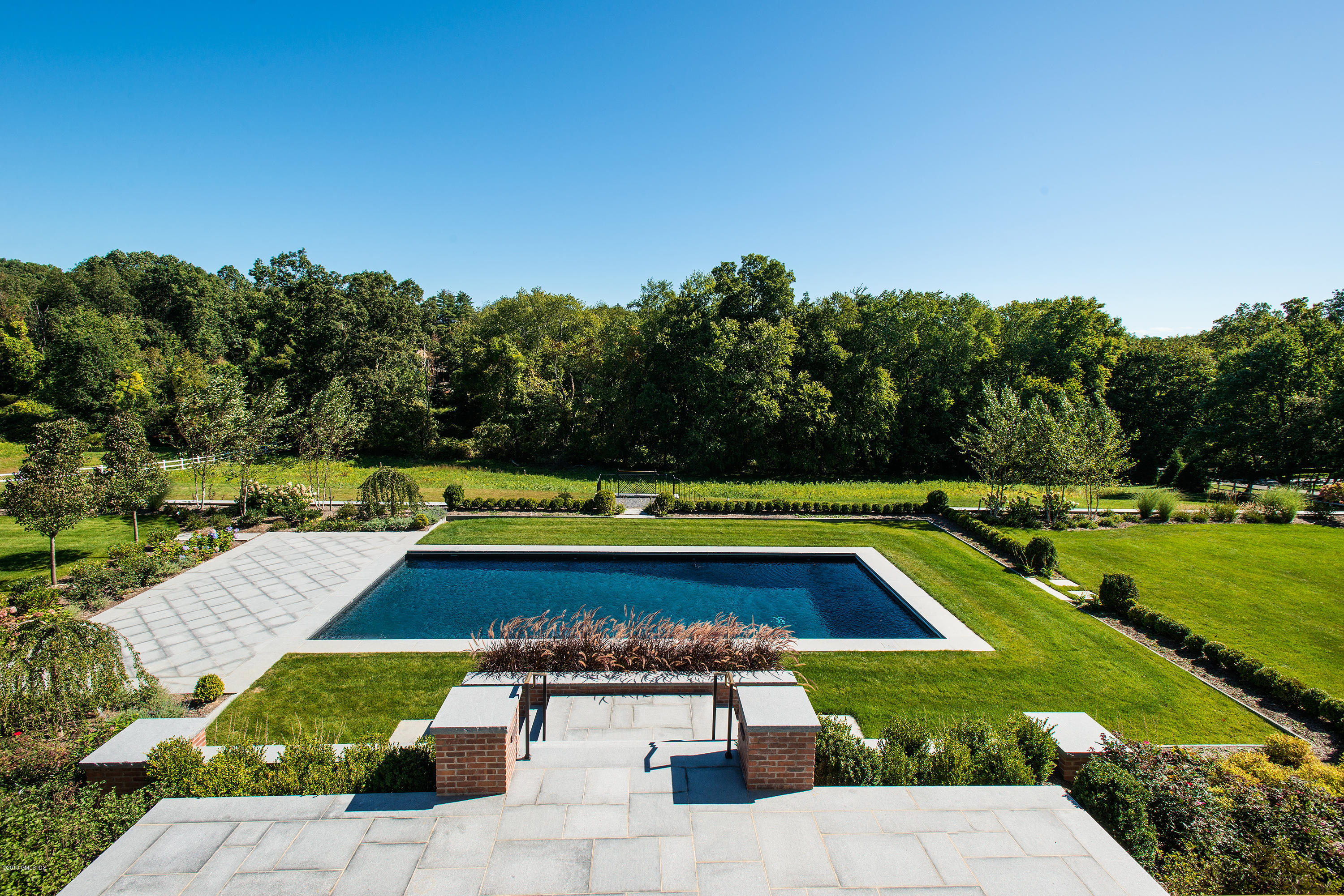 35 Mooreland Road Greenwich, CT 06831 - Photo 22 of 23 a view of swimming pool with a garden