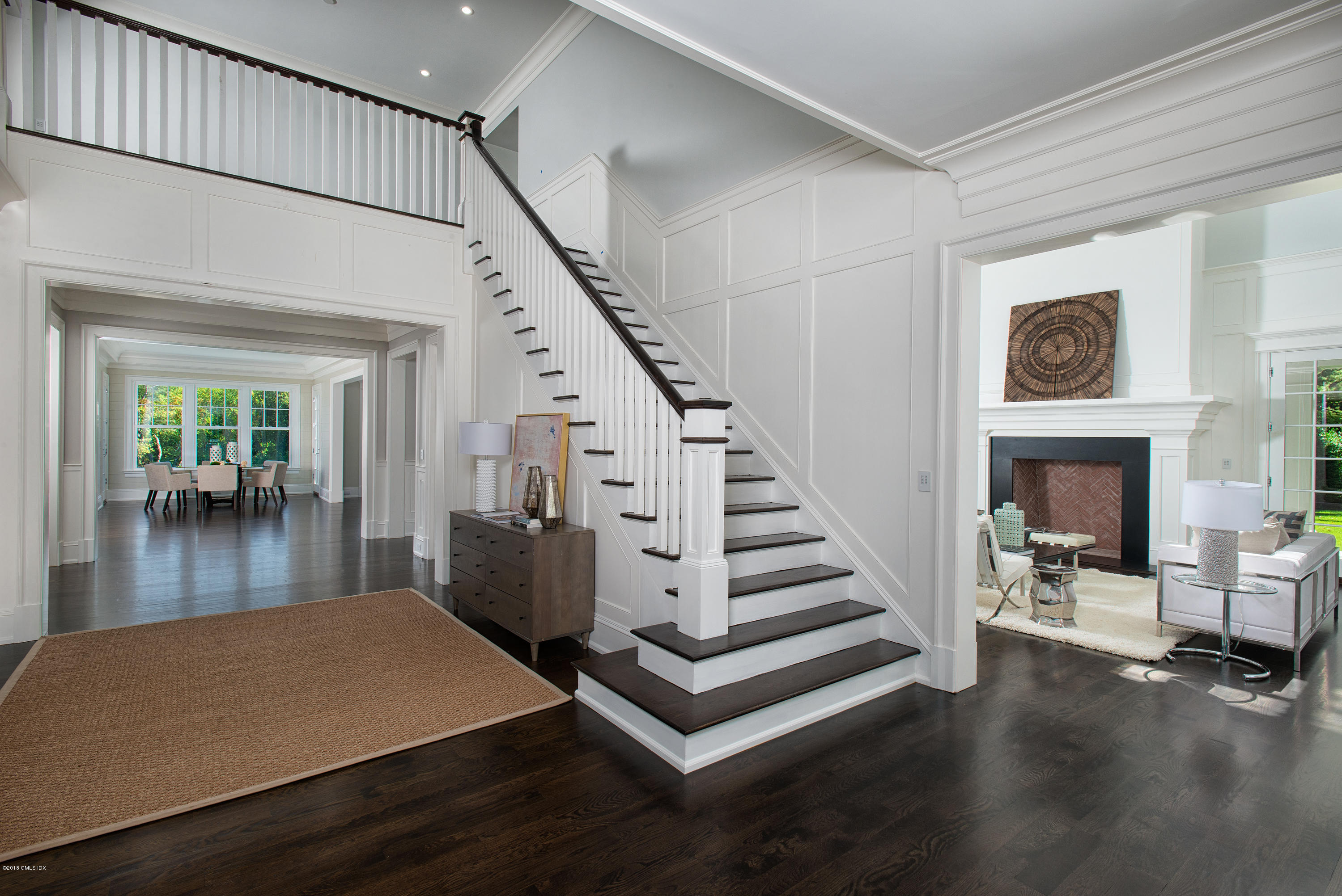 35 Mooreland Road Greenwich, CT 06831 - Photo 3 of 23 a view of a livingroom with furniture and staircase