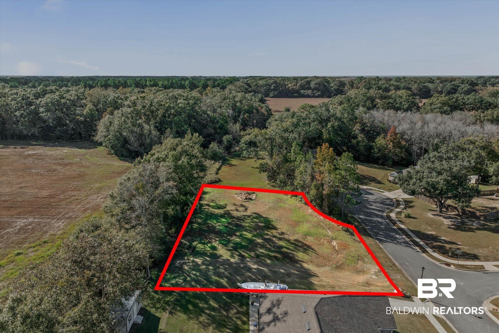 0 Acorn Way Grand Bay, AL 36541 - Photo 8 of 17 Aerial overview of property's location featuring property parcel outlined and a heavily wooded area