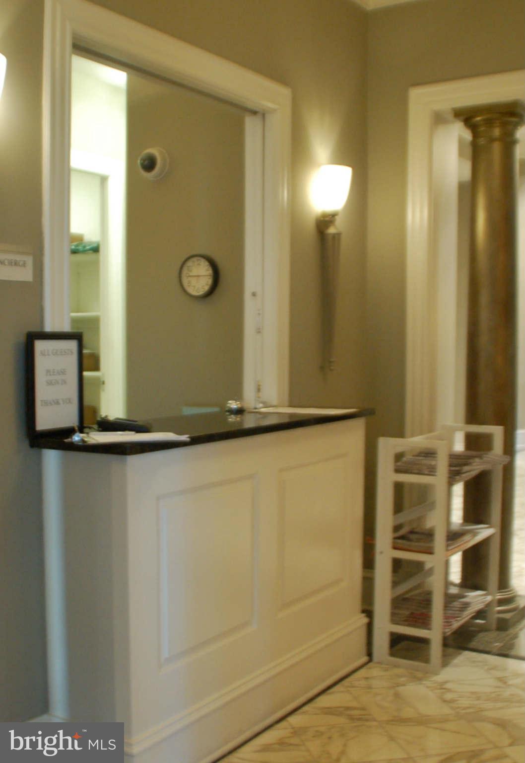 851 North Glebe Road, Unit 1015 Arlington, VA 22203 - Photo 2 of 19 a bathroom with a shower and a mirror