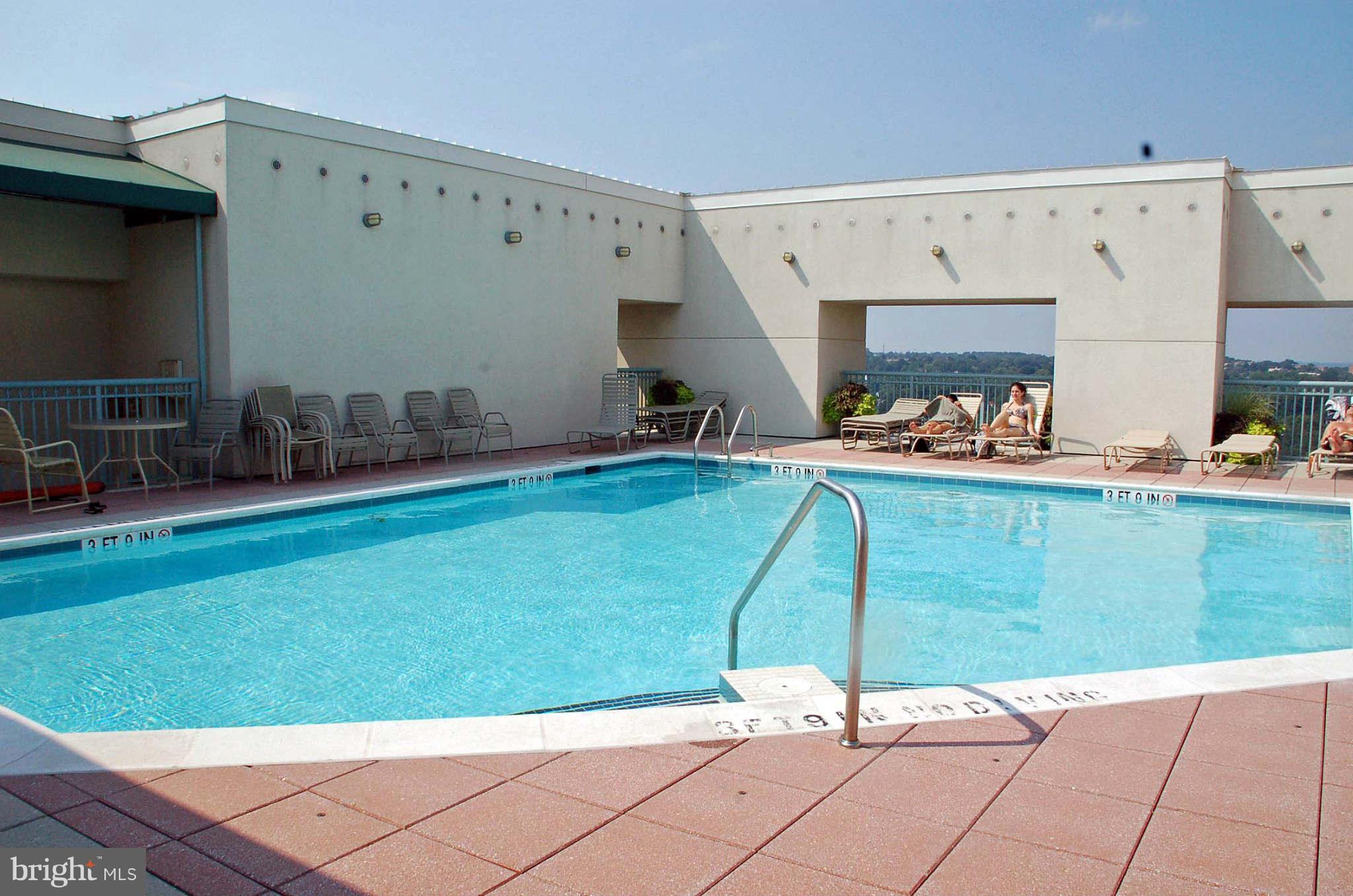 851 North Glebe Road, Unit 1015 Arlington, VA 22203 - Photo 18 of 19 a living room with furniture