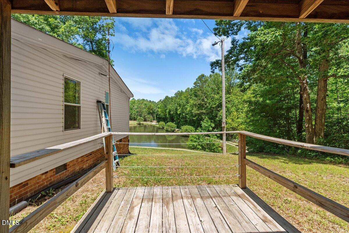 1111 Stoney Mountain Road Rougemont, NC 27572 - Photo 26 of 30 a view of balcony with two chairs