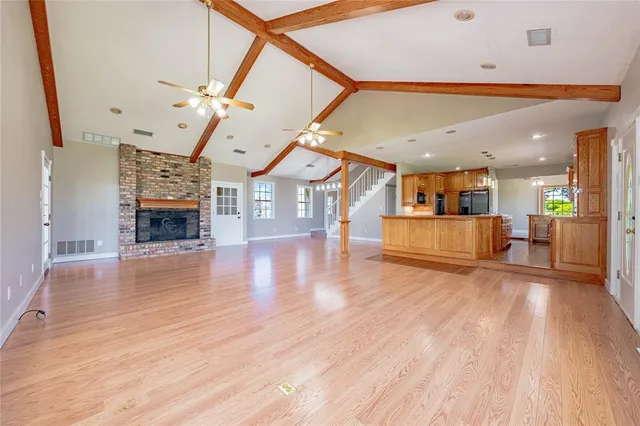 an entryway and livingroom with furniture