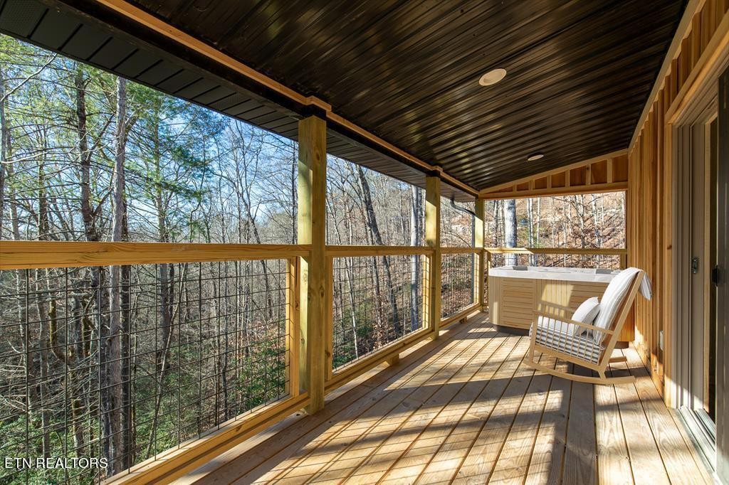 10795152 Shell Mountain Road Sevierville, TN 37876 - Photo 13 of 30 a view of a balcony with wooden floor