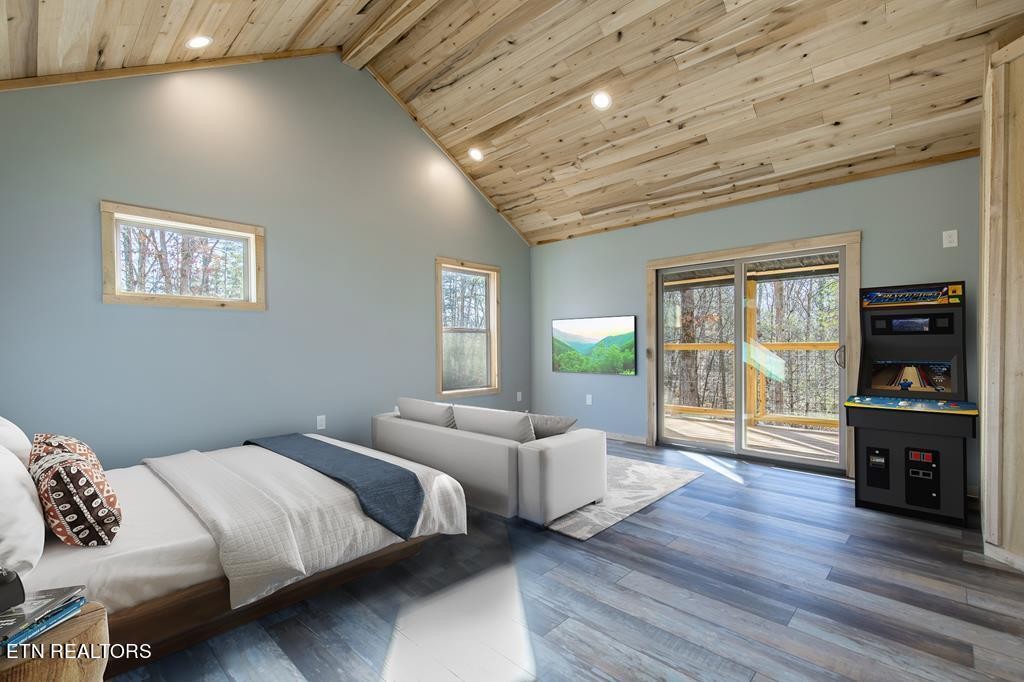 10795152 Shell Mountain Road Sevierville, TN 37876 - Photo 9 of 30 a bedroom with furniture and wooden floor