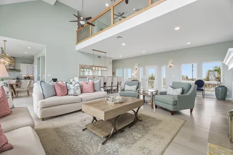 a living room with furniture and a table