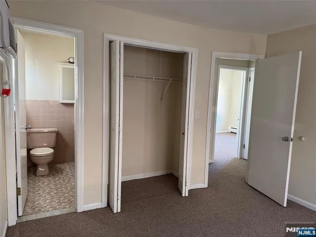 a view of a bathroom with a livingroom and a bathroom