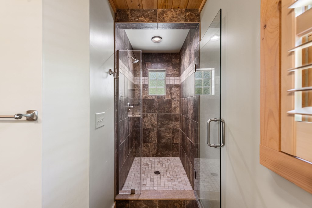 479 Big Timber Road Mineral Bluff, GA 30559 - Photo 23 of 60 a bathroom with a sink and mirror