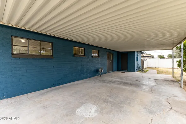 a view of a backyard of a house