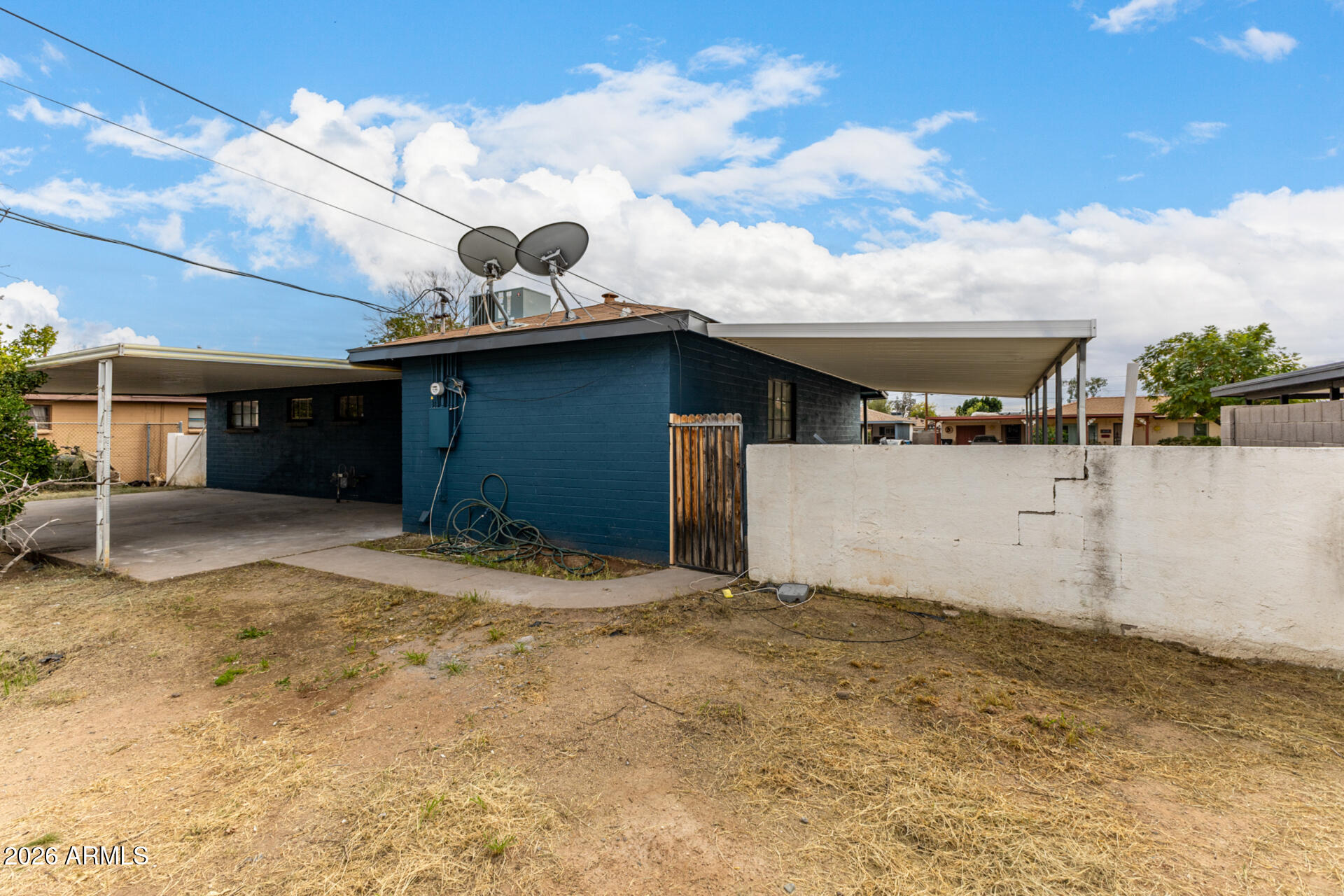 2114 West Rancho Drive Phoenix, AZ 85015 - Photo 28 of 29 a view of a house with a patio