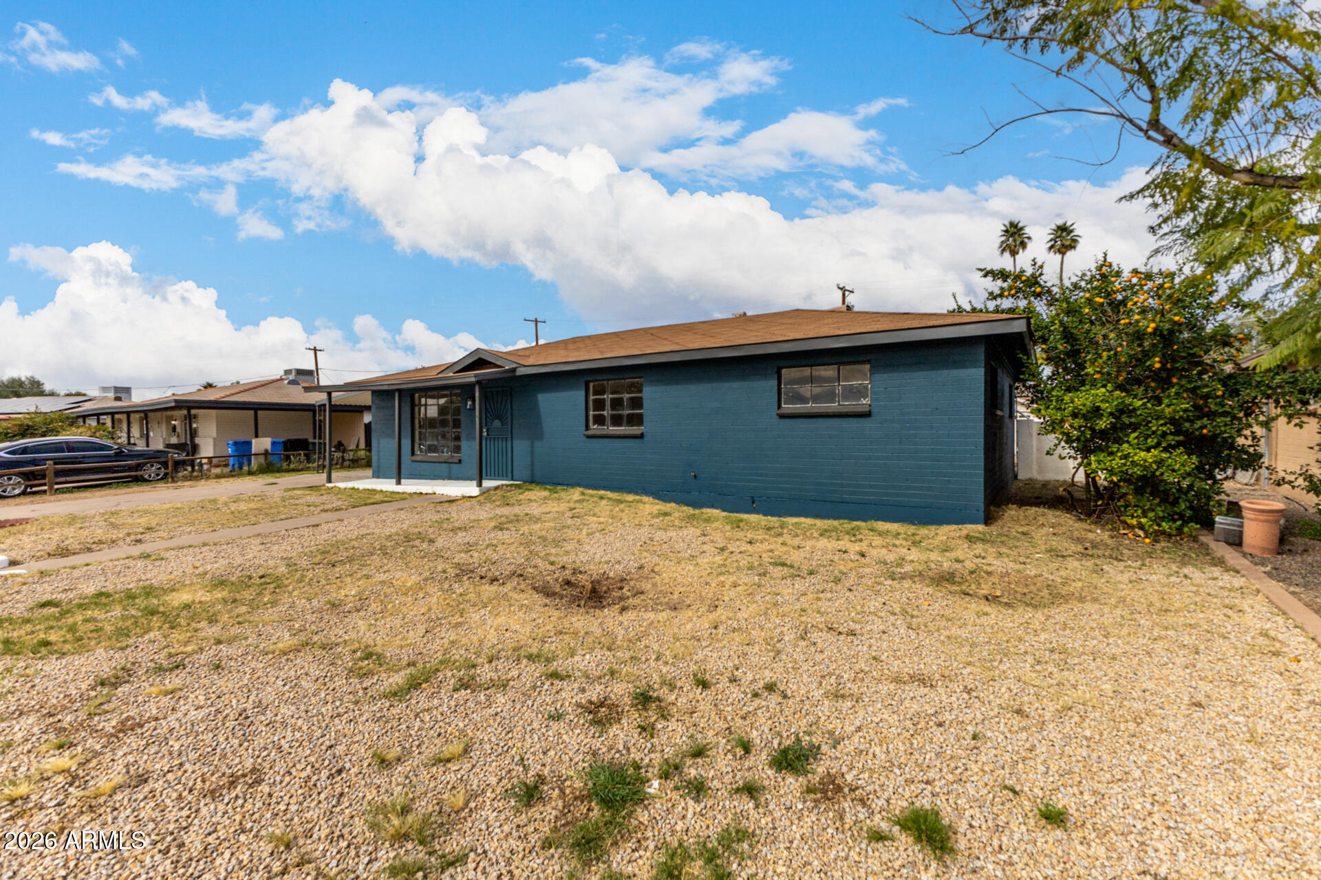 2114 West Rancho Drive Phoenix, AZ 85015 - Photo 4 of 29 a house view with a backyard