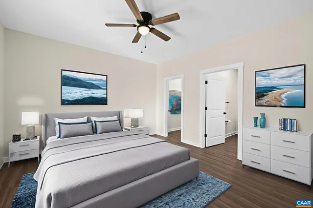 a bedroom with a bed and a dresser