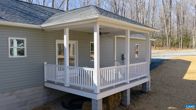 a view of a deck with a fence