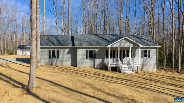 a view of a house with entrance gate