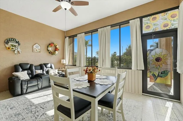 a view of a dining room with furniture